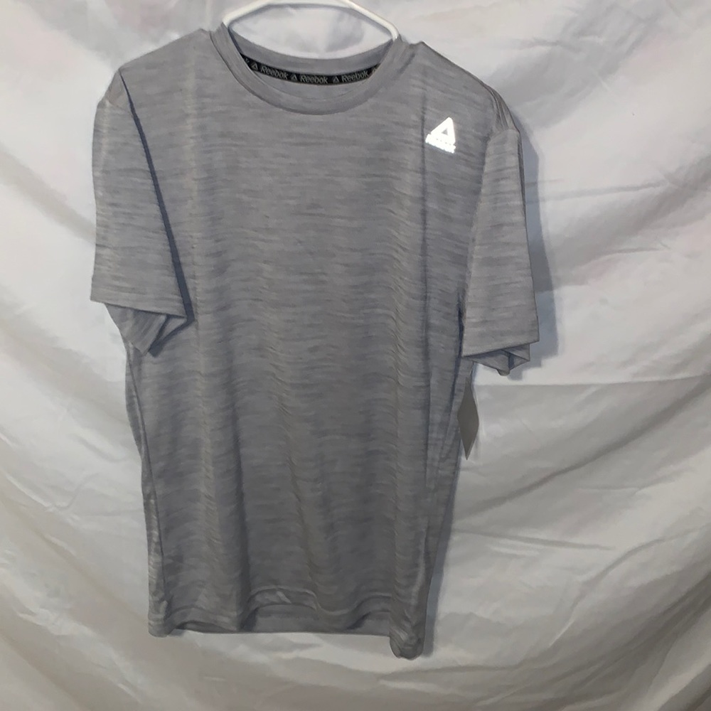 Grey Reebok t-shirt dry fit.